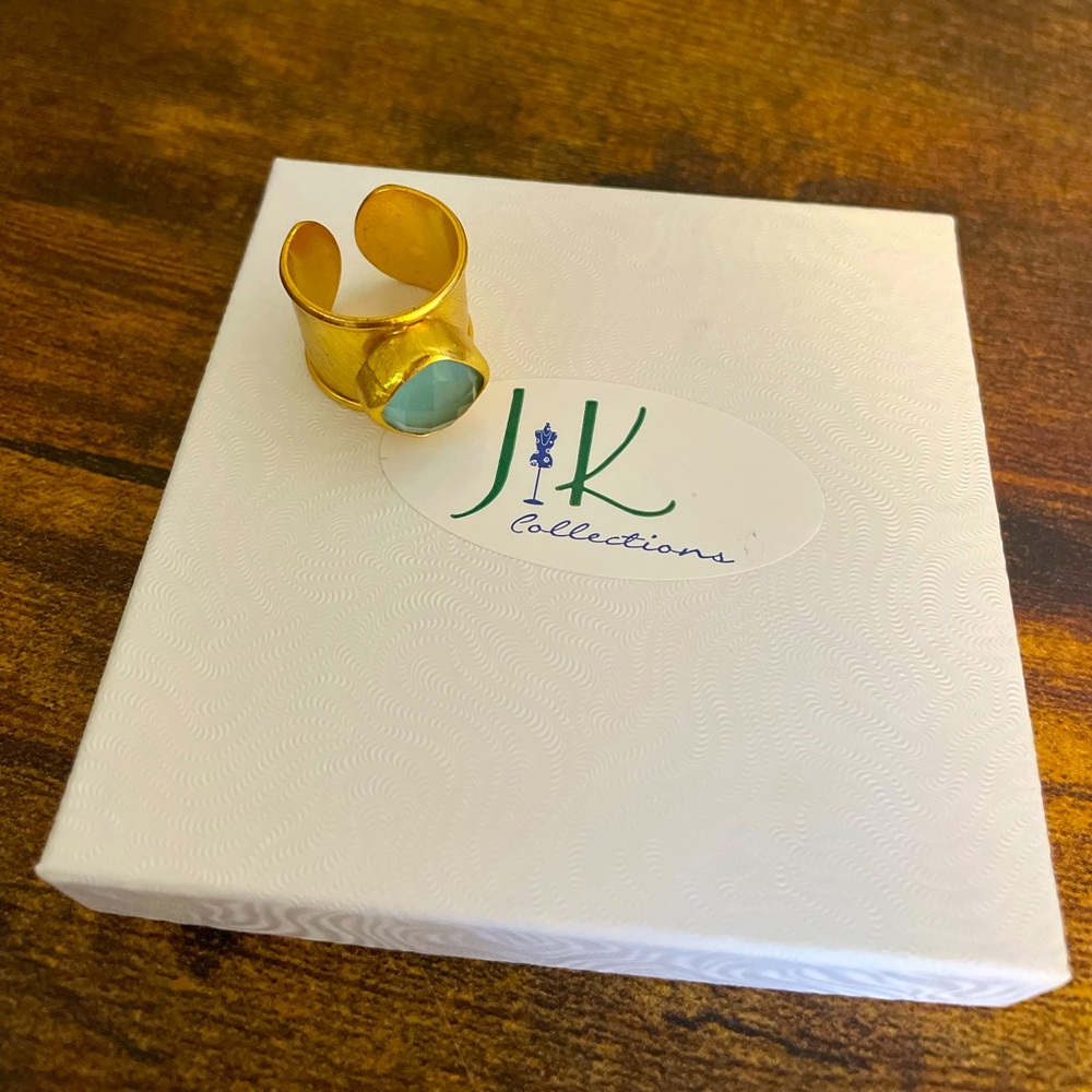 Brushed gold, blue topaz cuff ring by Jennifer Landis